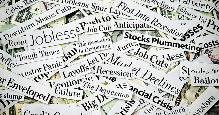 image of words cut out from a magazine on top of a dollar bill