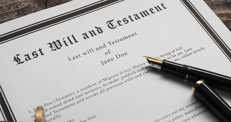 A photo of a paper Will, with paper money stacked on one side and a miniature house, pocked watch, and pen on the other side.